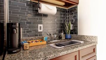 Fridge, coffee/tea maker, cookware/dishes/utensils