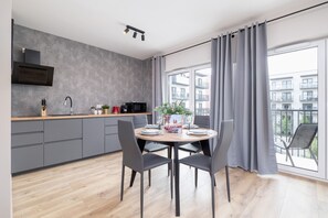 Studio, Balcony | Private kitchen | Microwave, dishwasher, coffee/tea maker - Cozy Apartment Klimeckiego 8A by Renters (Kraków)