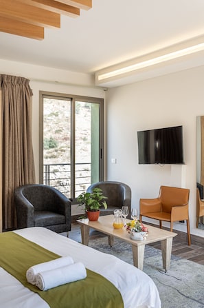 Suite Deluxe | Caja fuerte, tabla de planchar con plancha, wifi gratis y ropa de cama