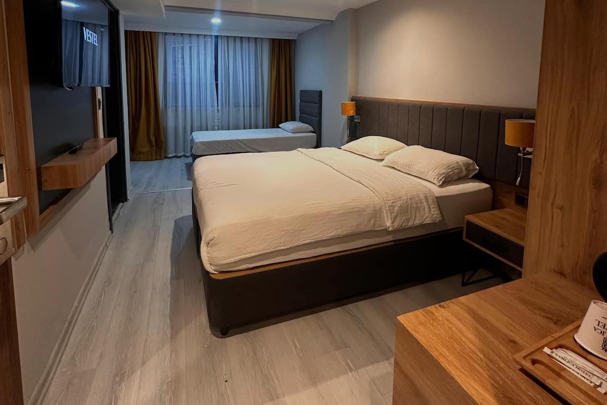 City Triple Room | Egyptian cotton sheets, premium bedding, down comforters