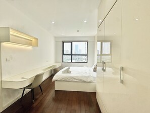 Departamento empresarial, 2 habitaciones | Sábanas de algodón egipcio y ropa de cama de alta calidad 