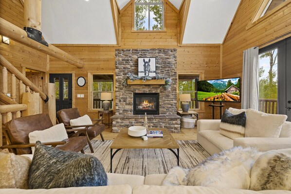 Smart-TV, Kamin, Tischtennisplatte, Bücher