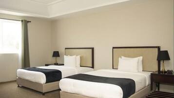 Deluxe Room, 2 Twin Beds | 1 bedroom, in-room safe, desk, iron/ironing board