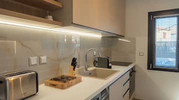 奢華公寓, 2 間臥室, 廚房, 地面 | 私人廚房 | 特濃咖啡機、電熱水壺、提供環保清潔產品、紙手巾