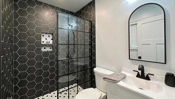 Shower, hair dryer, towels, soap