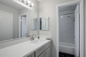 Hair dryer, towels, soap, shampoo