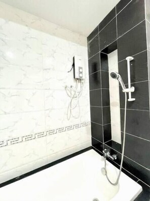 Shower, hair dryer, towels, soap