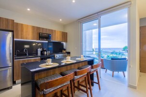 Apartment, 2 Bedrooms, Balcony, Ocean View | Private kitchen | Full-size fridge, microwave, oven, stovetop