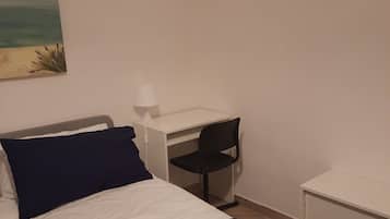 1 bedroom, desk, iron/ironing board, travel crib