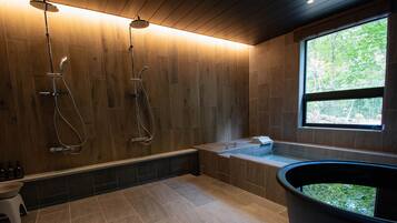 Deluxe Room (Type B) | Bathroom | Separate tub and shower, spring water tub, rainfall showerhead