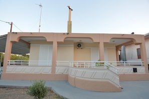 Stylish building with a central entrance and staircase.