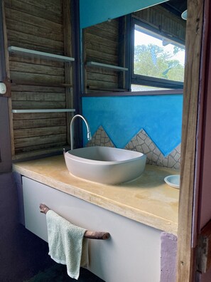 Shower, towels, soap, toilet paper