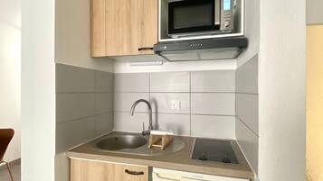 Fridge, microwave, coffee/tea maker, toaster