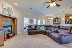 TV, fireplace, books