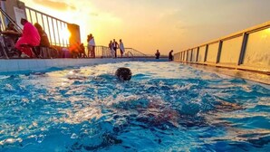 A swimming pool with people around it. - Songeza Furnished Accomoda-super Studio,embakasi (Nairobi)