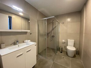 Hair dryer, towels, soap, shampoo