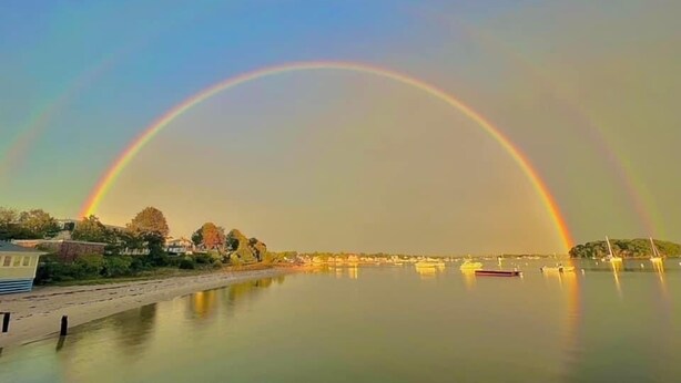A calm waterfront with a rainbow arching over the water. - Relaxing Water view Onset Beach 3 bedrooms walking distance to everything (Wareham)