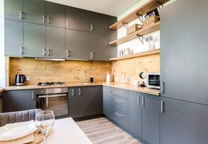 Fridge, oven, stovetop, electric kettle - RC Apartment
 (Kaunas)