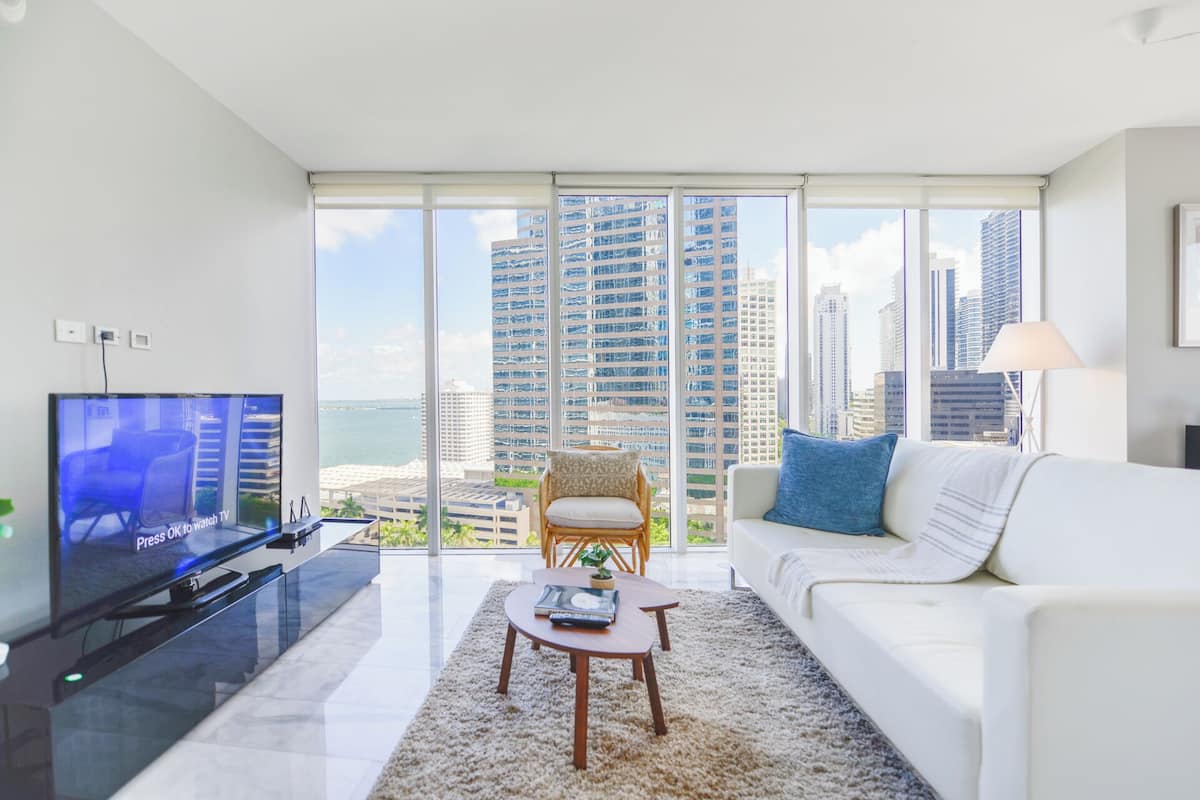 Luxury Condo, 2 Bedrooms, City View | Living area | 50-inch Smart TV with cable channels