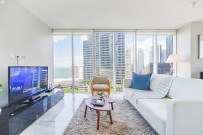 Luxury Condo, 2 Bedrooms, City View | Living area | 50-inch Smart TV with cable channels - Amazing Condos at Icon Brickell With Pool (Miami)