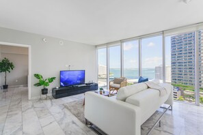 Panoramic Condo, 2 Bedrooms, City View | Living area | 50-inch Smart TV with cable channels - Amazing Condos at Icon Brickell With Pool (Miami)
