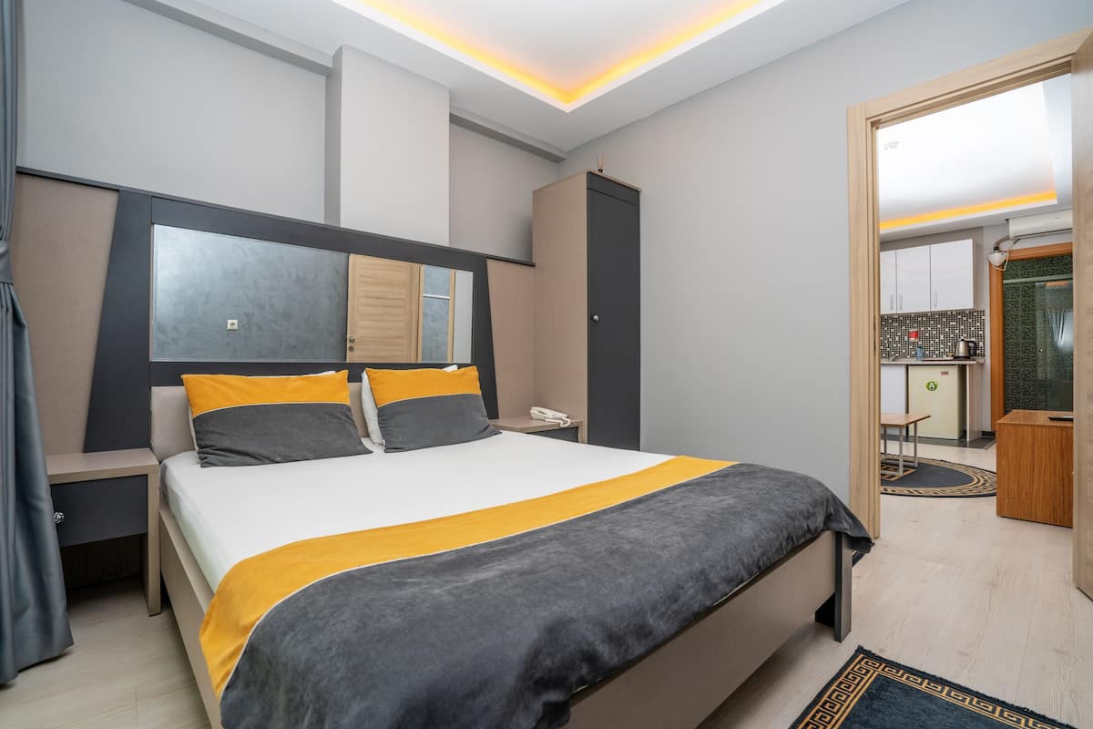 Family Apartment | 1 bedroom, premium bedding, in-room safe, blackout curtains