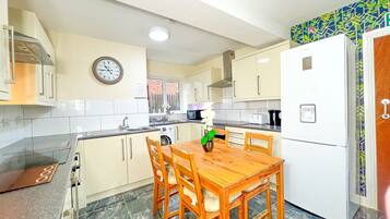 Fridge, microwave, cookware/dishes/utensils