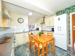 Fridge, microwave, cookware/dishes/utensils