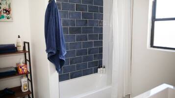 Shower, eco-friendly toiletries, hair dryer, towels