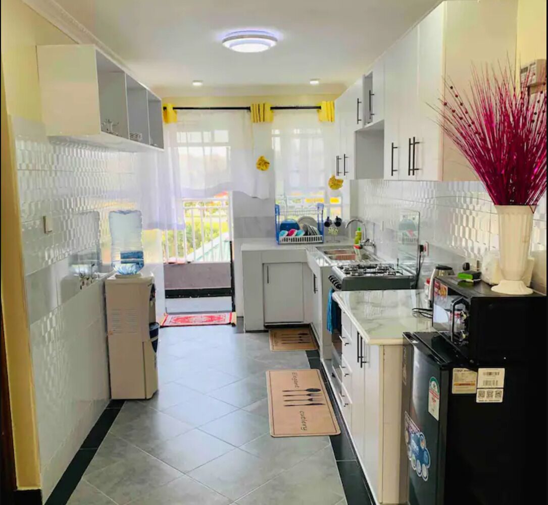 Fridge, microwave, stovetop, cookware/dishes/utensils