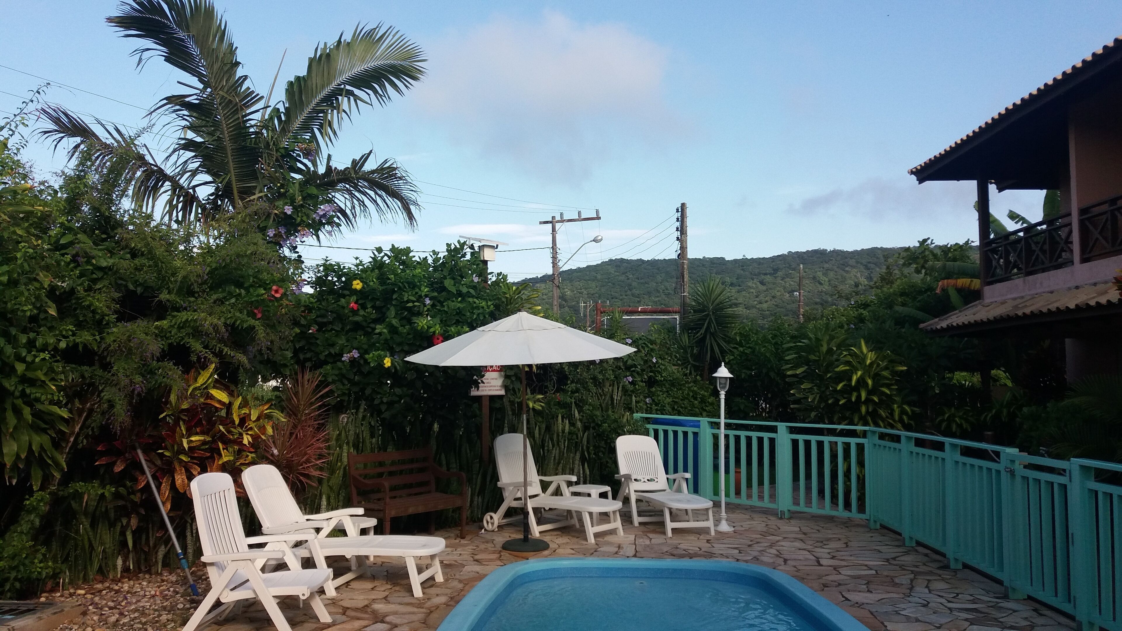 Outdoor pool, open 8:00 AM to 9:00 PM, pool umbrellas, sun loungers