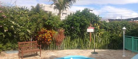 Outdoor pool, open 8:00 AM to 9:00 PM, pool umbrellas, sun loungers