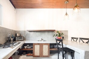 Fridge, stovetop, coffee/tea maker, toaster