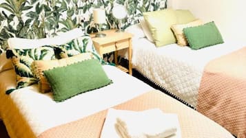 2 habitaciones, tabla de planchar con plancha, cuna de viaje y wifi