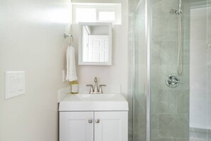 Hair dryer, towels, soap, shampoo