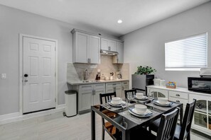 Fridge, microwave, stovetop, coffee/tea maker - The South El Monte Solitude: 2BR Retreat with Enchanting Patio, 55" TV, and Effortless Parking! (South El Monte)