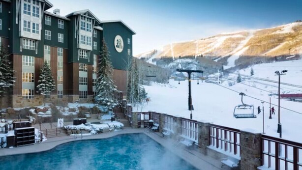 A hotel with a pool, ski lift, and snowy mountain views. - Marriott's MountainSide (1BR) (Park City)