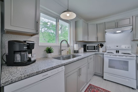 Fridge, microwave, oven, stovetop. Live Like a Local | North Chattanooga Stay (left unit)