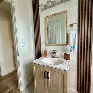 Hair dryer, towels, soap, shampoo