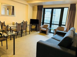 Family Apartment, Multiple Bedrooms | Living area