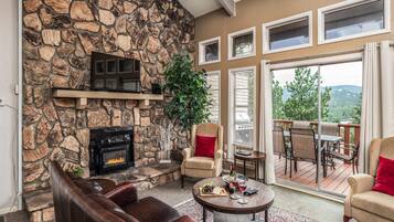 Condo, Multiple Beds, Balcony, Mountain View | Living area | TV, fireplace