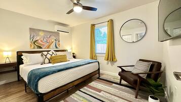 3 habitaciones, tabla de planchar con plancha y cuna de viaje