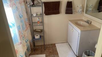 Hair dryer, towels, soap, shampoo