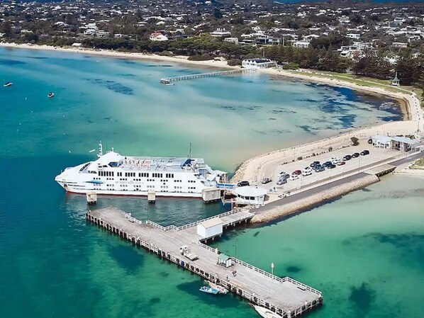 Enjoy scenic views of the coastline from the pier, where a ferry offers transportation to nearby destinations.