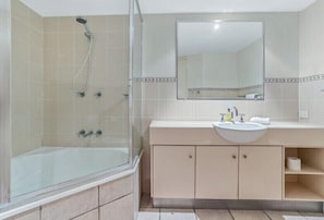 Combined shower/tub, hair dryer
