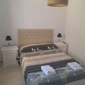 2 dormitoris i roba de llit 