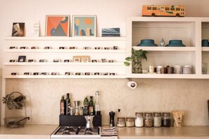 Fridge, stovetop, coffee/tea maker, cookware/dishes/utensils