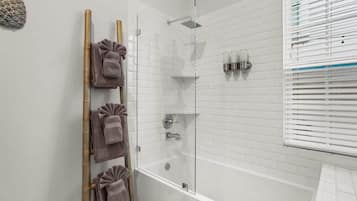 Bathtub, hair dryer, towels
