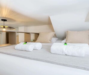 Iron/ironing board, travel crib, WiFi, bed sheets