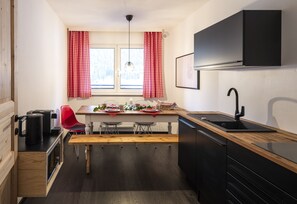 Microwave, stovetop, dishwasher, coffee/tea maker